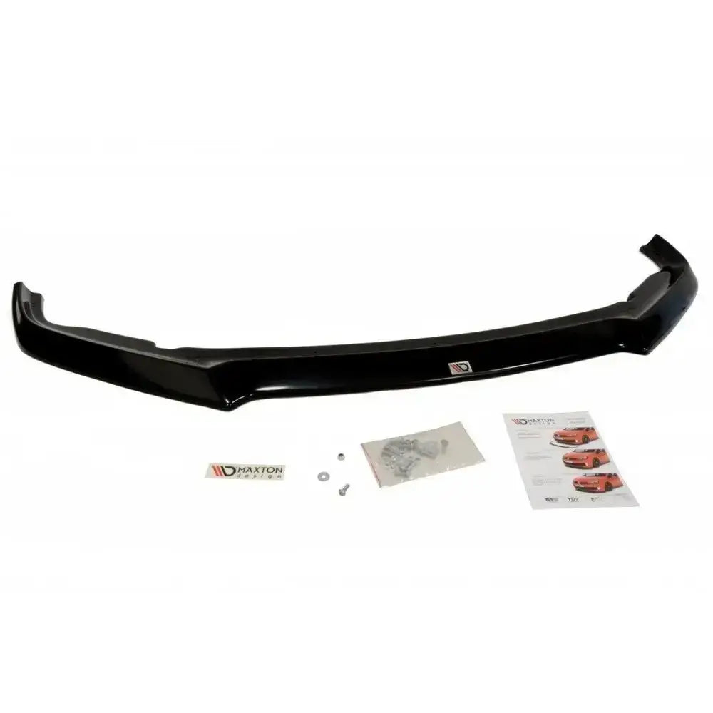 Front splitter til Toyota GT86 i sort glanset plast med monteringssett, instruksjonsark og logo.