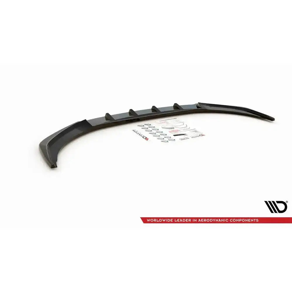 Spoiler til Audi A1 S-Line GB V.1 sett skrått ovenfra, sort plast med ribber og monteringsutstyr på hvit bakgrunn.