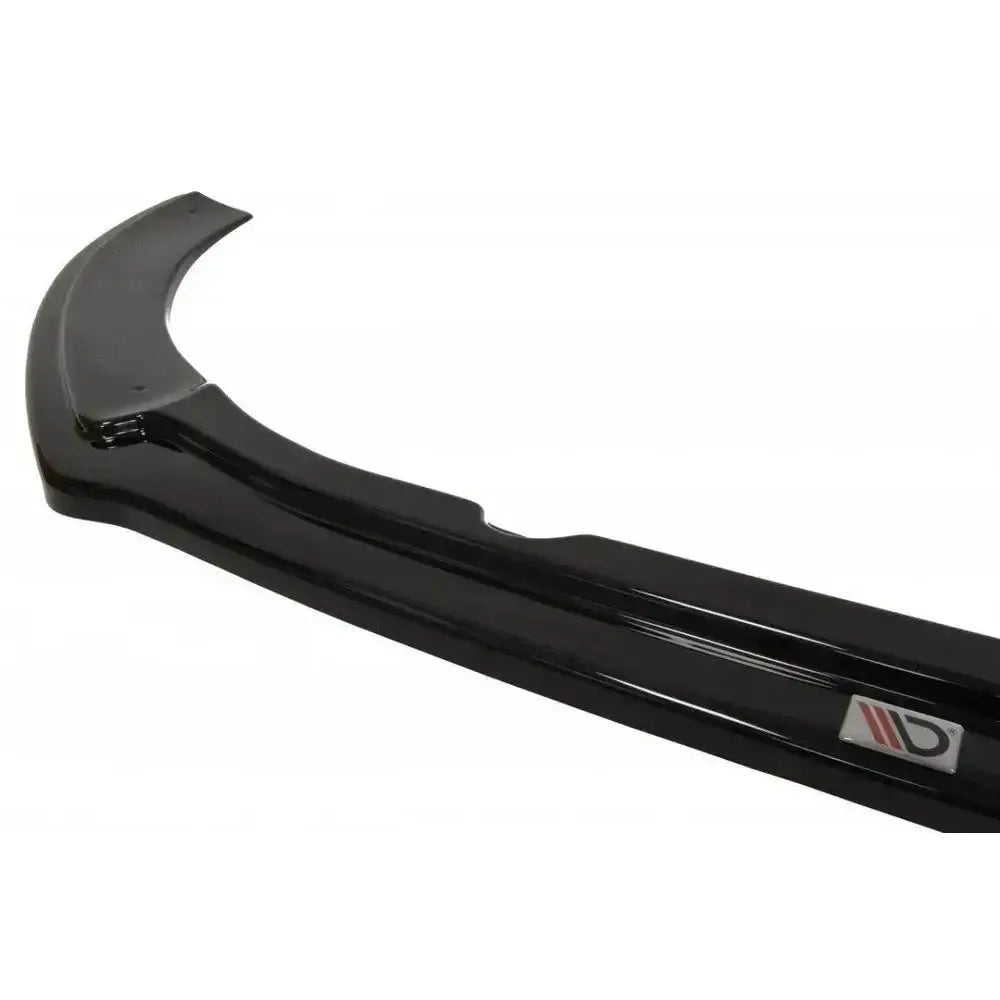 Frontspoiler Audi RS6 C7 V.1 i sort blank plast med synlig logo på hvit bakgrunn.