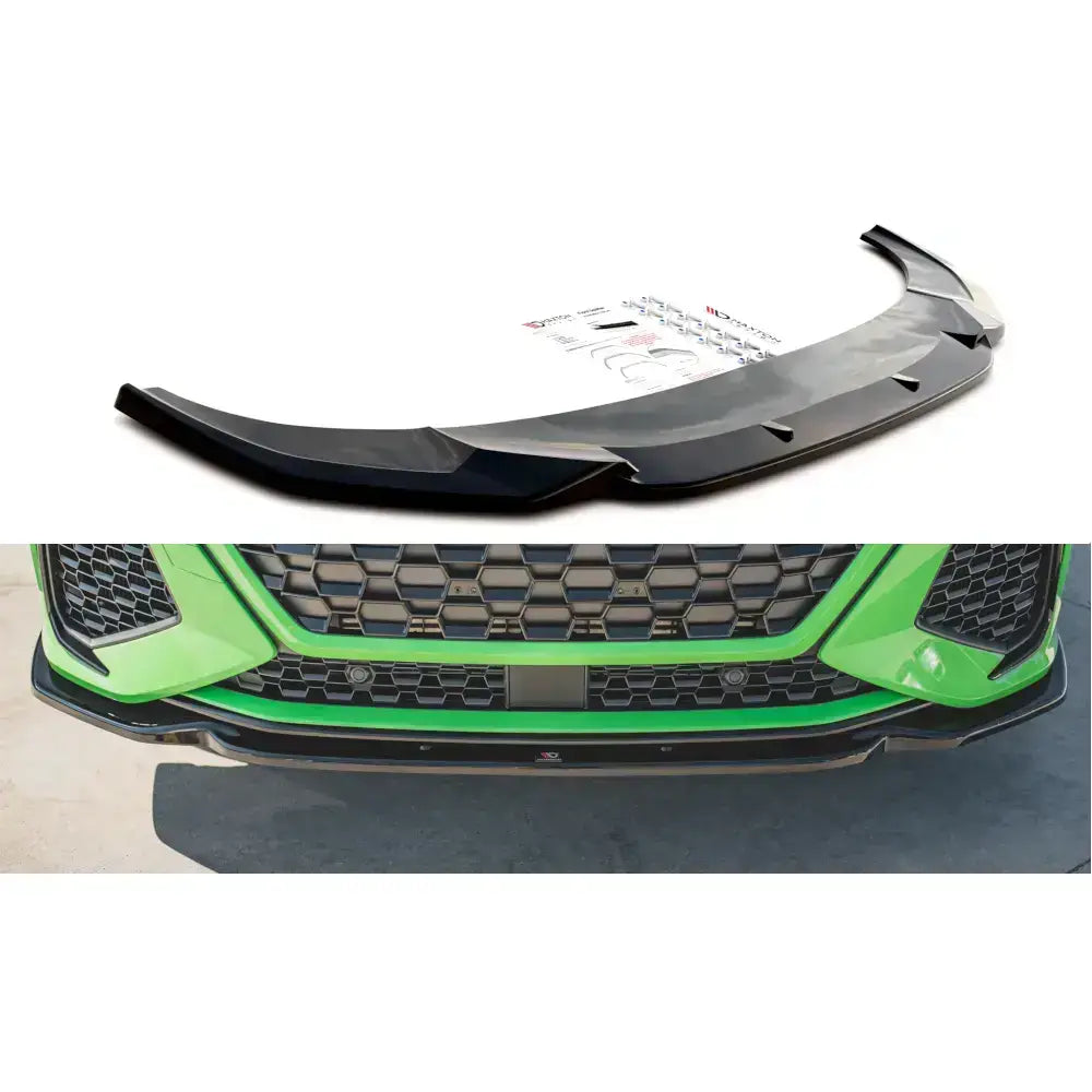 Frontspoiler Audi RSQ3 F3 V.1 i sort plast montert på grønn bil med markerte sportslige linjer.