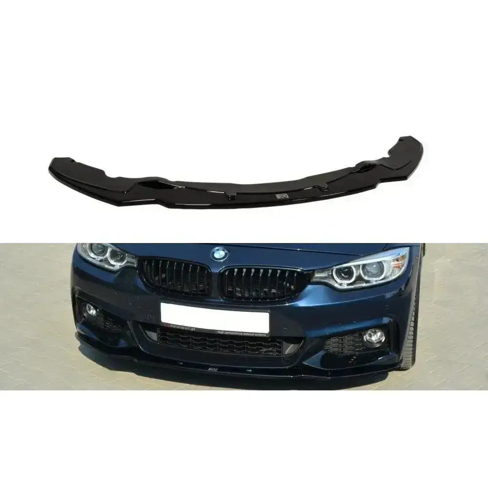 Frontspoiler BMW 4 F32 M-Pack V.1 sort plast montert på mørk blå bil sett rett forfra.