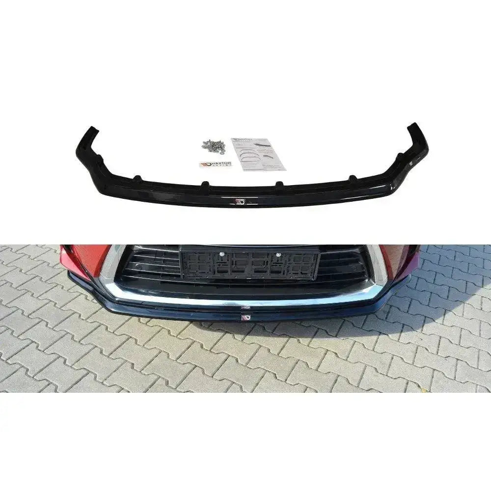 Frontspoiler Lexus RX Mk4 V.1 i sort plast med blank finish, monteringsskruer og instruksjoner synlig.