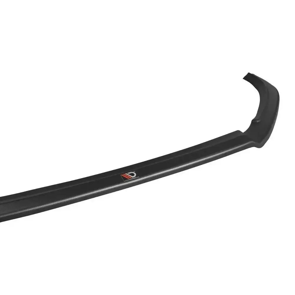 Frontspoiler Mazda 3 BM Facelift V.1 i sort plast sett skrått ovenfra med logo og teksturert overflate.