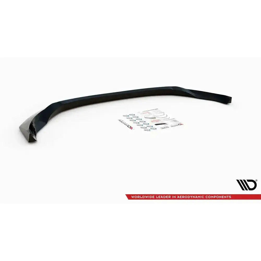 Frontspoiler Nissan 370Z Facelift V.1 sett skrått med monteringsutstyr og instruksjoner på hvit bakgrunn.