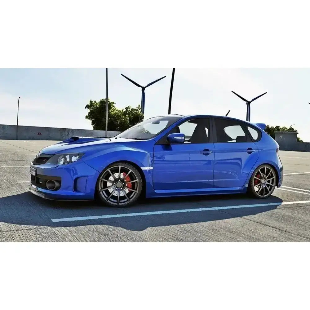 Frontleppe på Subaru Impreza Wrx Sti 2009-2011, blå bil med sportsfelger og røde bremsekalipere.