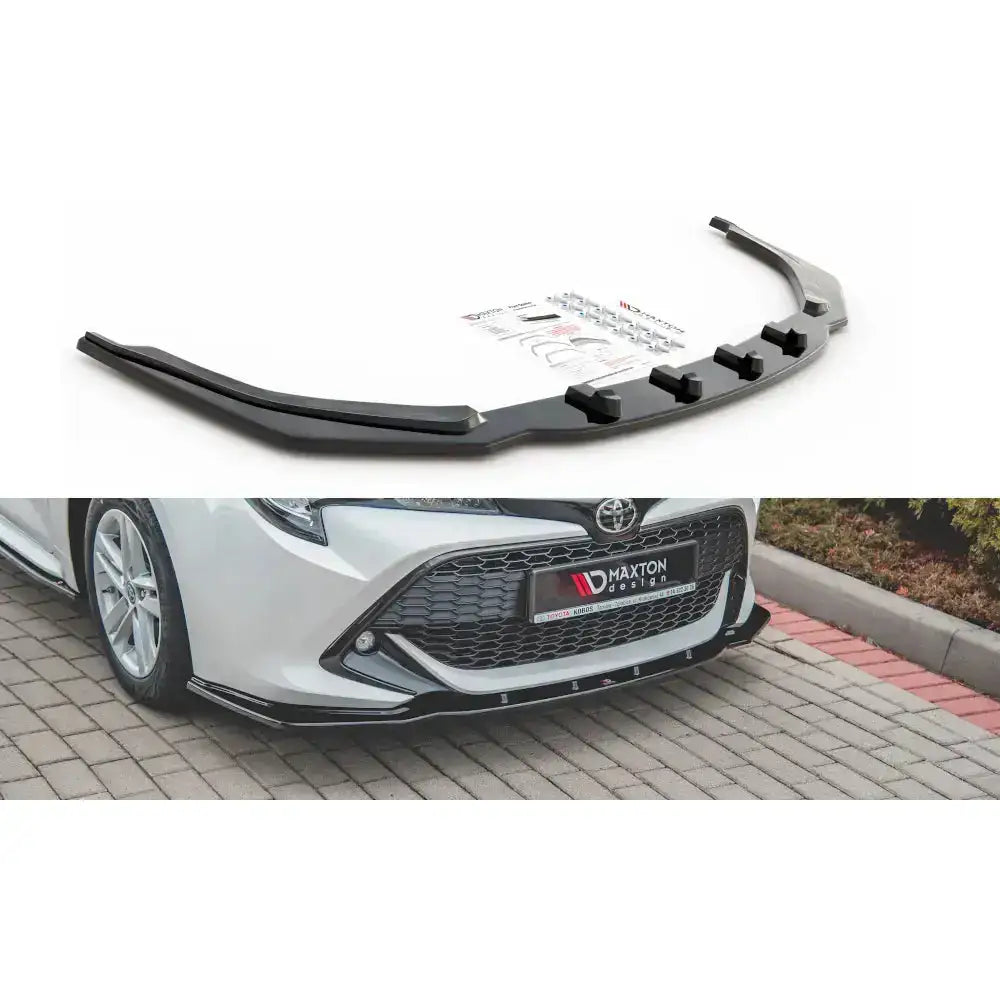 Frontleppe til Toyota Corolla XII, sort plastspoiler vist med monteringsdetaljer på hvit bil.