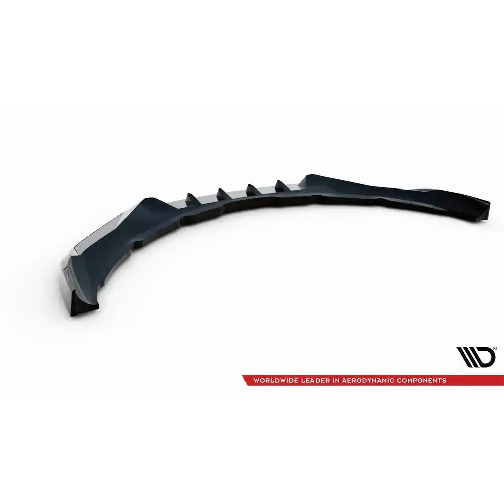 Frontspoiler Volvo S60 R-Design Mk2 V.1 i svart plast med finner, sett skrått mot hvit bakgrunn.