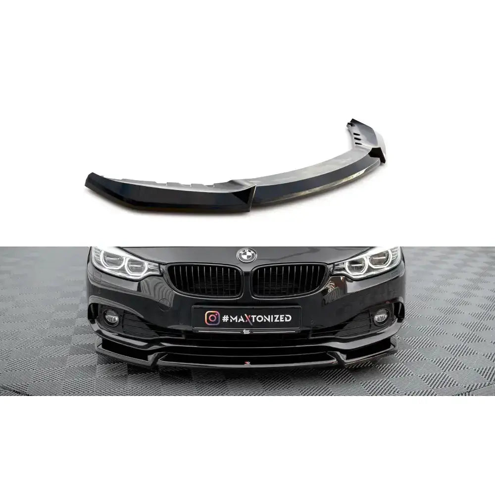 Frontspoiler BMW 4 Gran Coupe F36 V.2 i blank svart plast, vist montert på sort bil forfra.