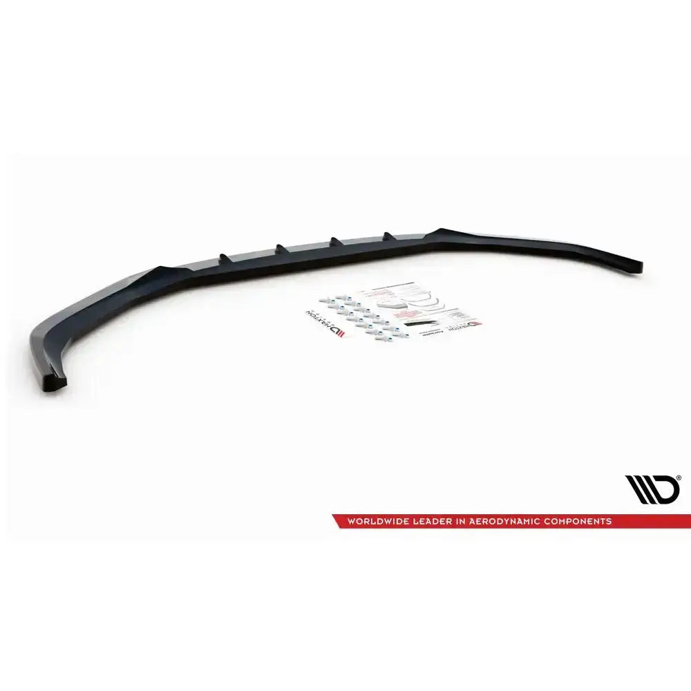 Frontspoiler BMW 5 G30 17-20 V.2 med monteringssett og instruksjoner på hvit bakgrunn.