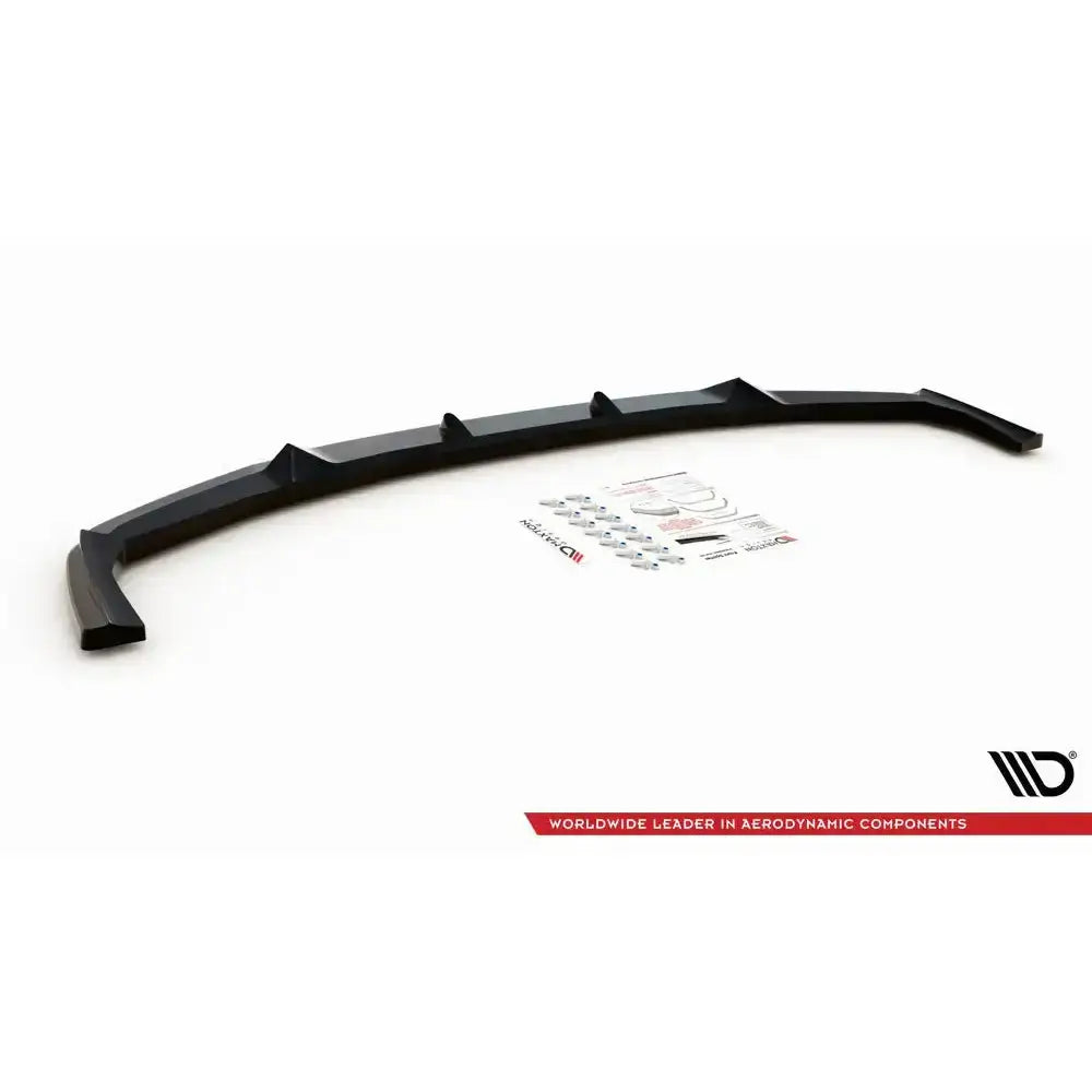 Frontspoiler BMW X5M F95 V.2 svart plast med monteringsutstyr og instruksjoner på hvit bakgrunn.