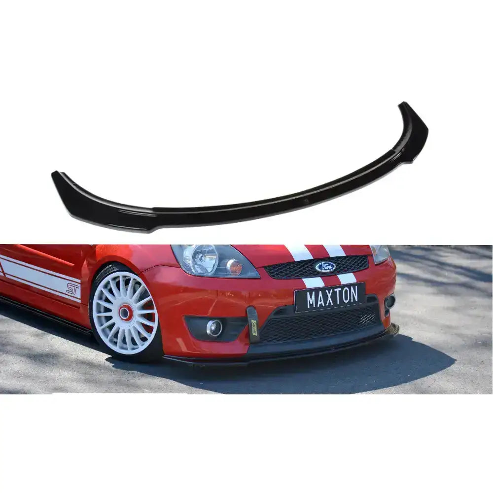 Frontspoiler til Ford Fiesta Mk6 St V.2 i sort plast montert på rød bil med hvite felger og striper.