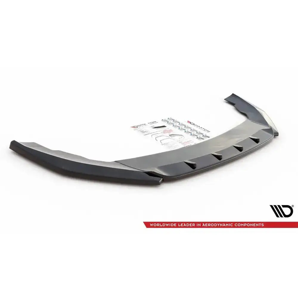 Front splitter til Seat Leon FR Mk4 V.2, svart plast med monteringsutstyr og instruksjoner bak.