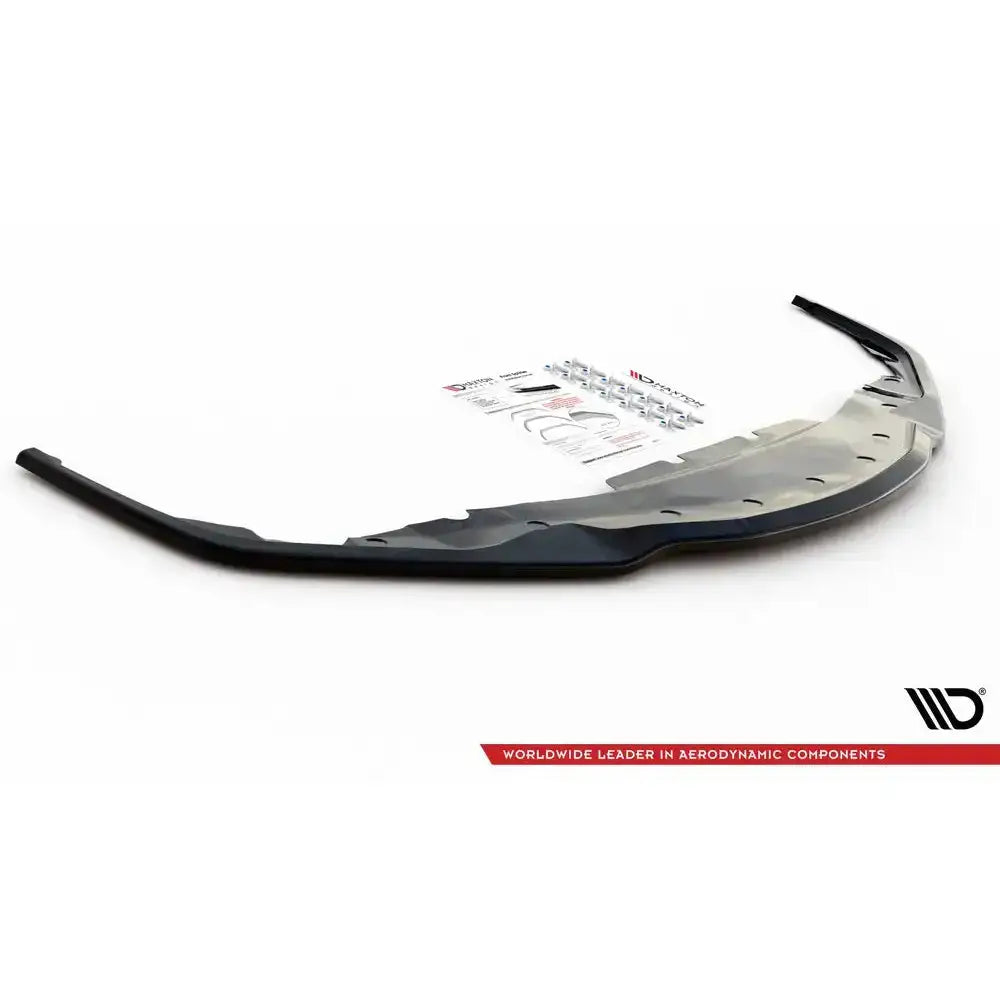 Frontspoiler Toyota Supra Mk5 V.2 svart plast med matt finish, sett skrått ovenfra med monteringssett bak.