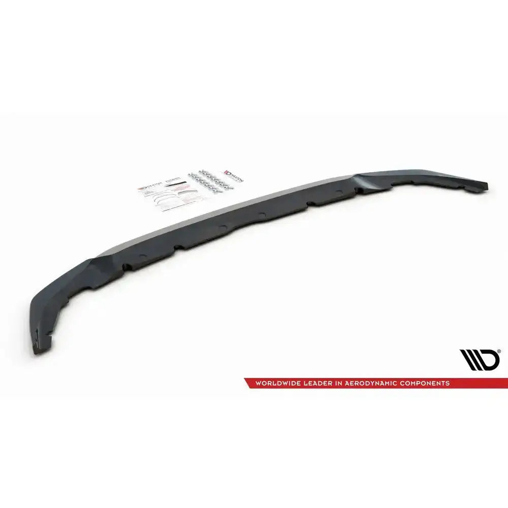 Frontspoiler BMW 1 F40 M-Pack V.3 svart plast, skrått ovenfra med monteringsutstyr og instruksjoner bak.