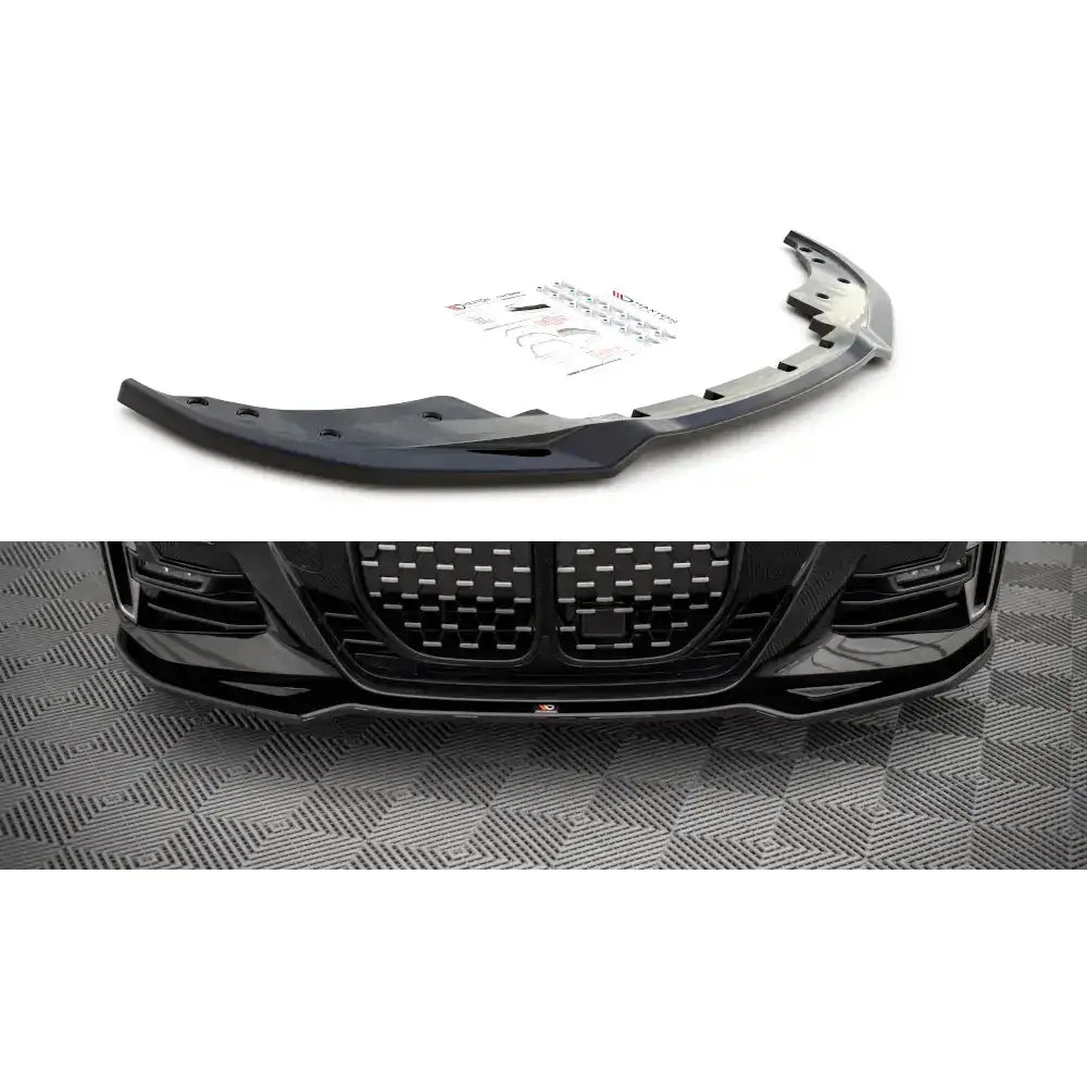 Frontspoiler BMW 4 M-Pack G22 V.3 sort plast med monteringstilbehør vist ovenfra og montert på bilfront.