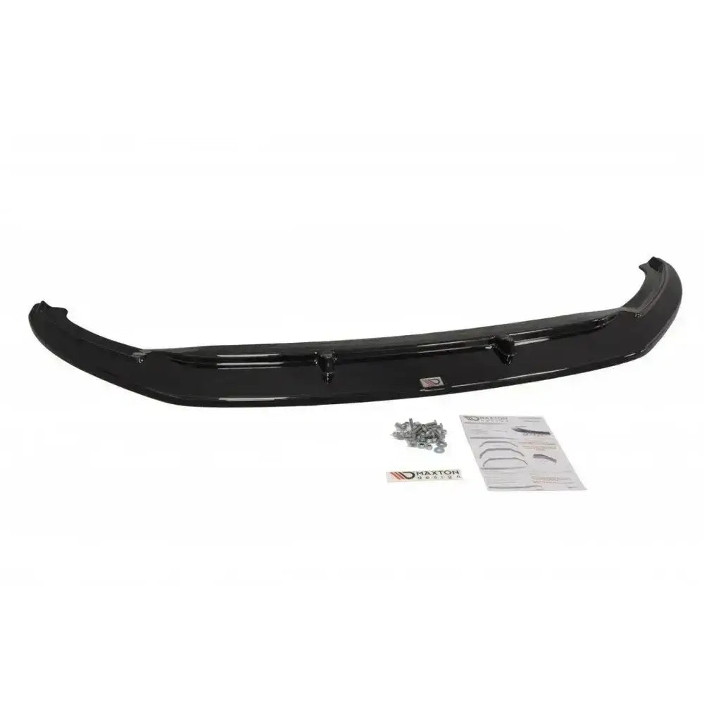 Frontspoiler Skoda Superb III V.3 sett ovenfra med monteringsskruer, instruksjonsark og merkeetikett.