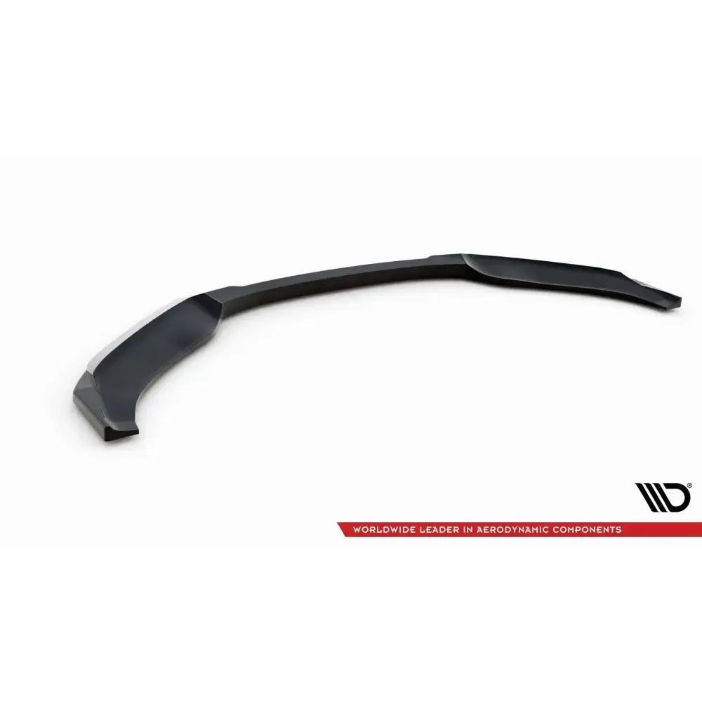 Frontspoiler Audi TT S V.1 i svart plast sett skrått ovenfra med rød banner og logo på hvit bakgrunn.