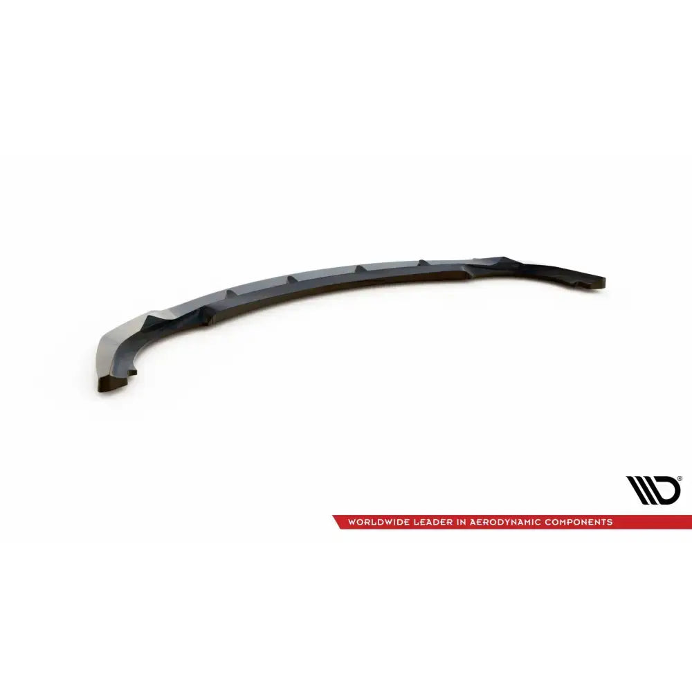 Front lip til BMW 3 Coupe E46 V.1, svart plast med markerte kanter, sett skrått ovenfra på hvit bakgrunn.