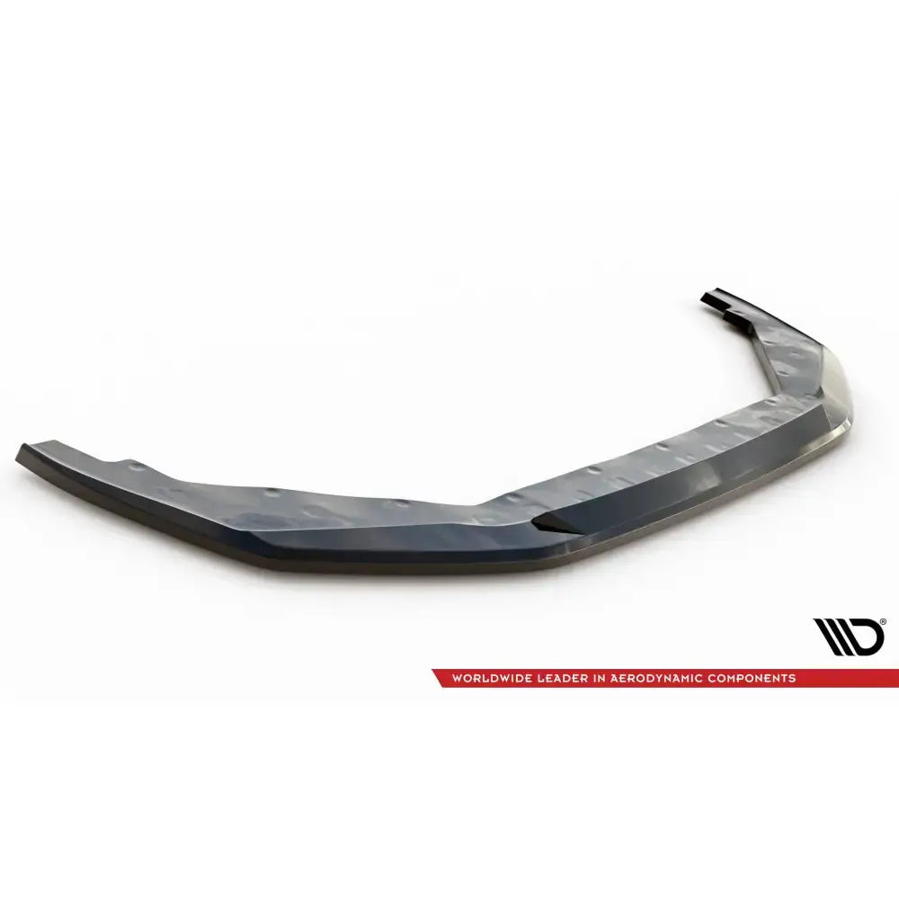 Frontspoiler Nissan GTR R35 Facelift V.1 i glanset materiale med markant mønster, sett skrått ovenfra.