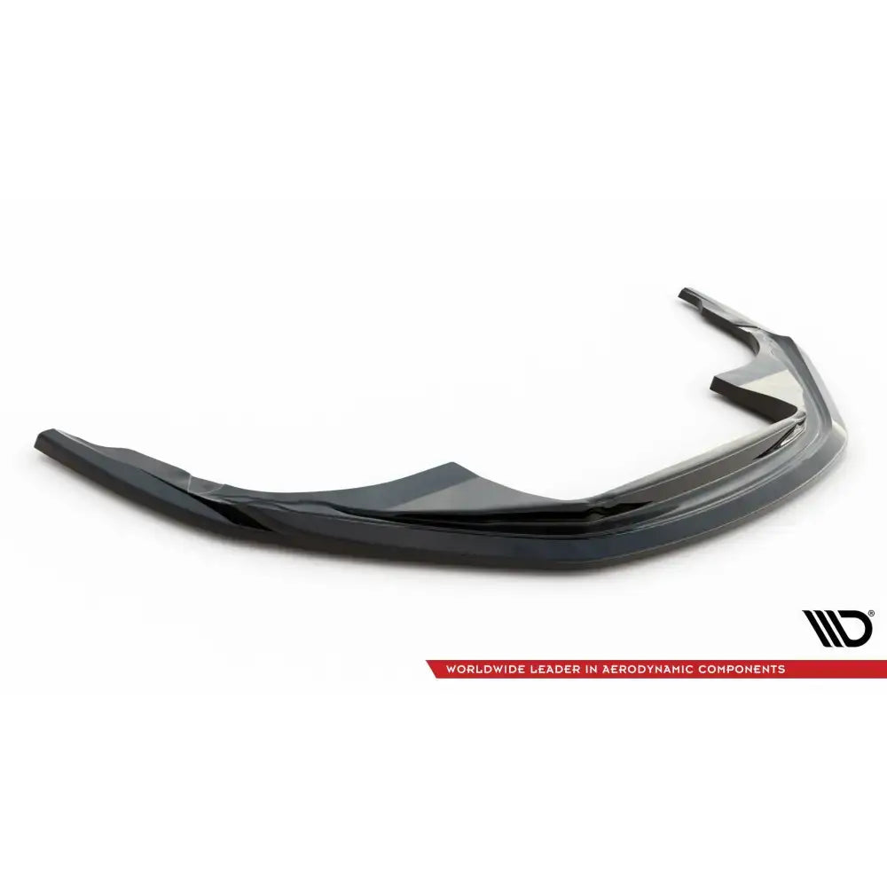 Frontspoiler Porsche 911 Carrera Aero 992 V.1 i sort glanset plast sett fra siden og litt ovenfra.