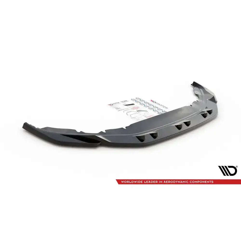 Front lip til Volkswagen Tiguan Mk2, sort plast splitter med monteringsutstyr og instruksjoner mot hvit bakgrunn.