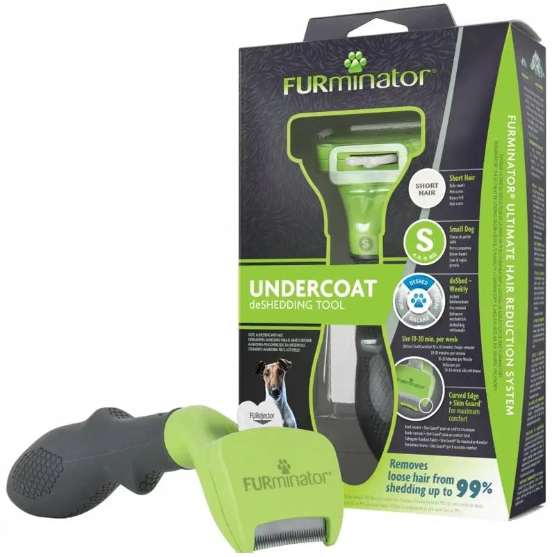 Furminator for kort pels, grønn og svart børste med ergonomisk grep foran original eske med instruksjoner og logo.