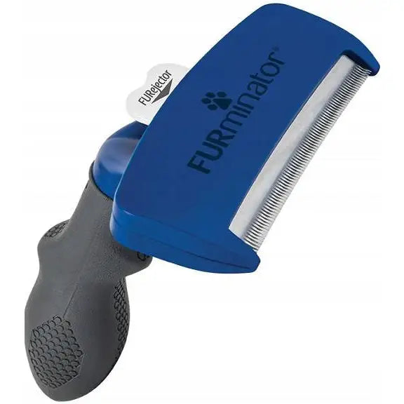 Furminator Hund Kort Hår L, blå børste med ergonomisk grep og metallkam, logo synlig på børstehodet.