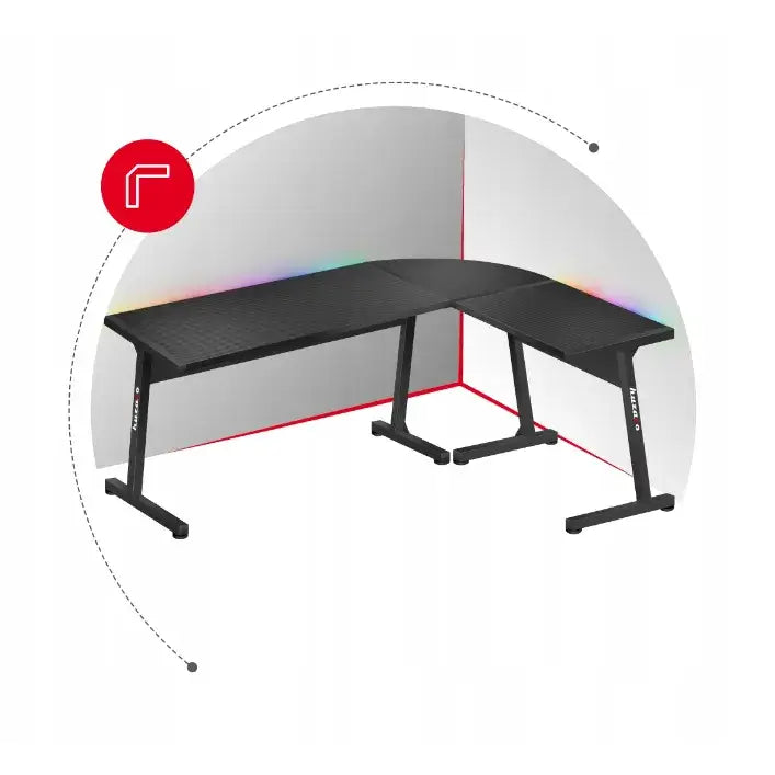 Gaming hjørnebord Huzaro Hero 6.0 RGB, L-formet svart design med RGB-lys, sett skrått mot hjørnet.