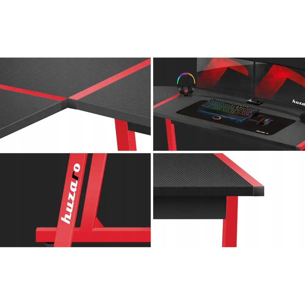 Gaming hjørnebord Huzaro Hero 6.0, nærbilde av sort teksturert bordplate med røde detaljer og synlig logo.