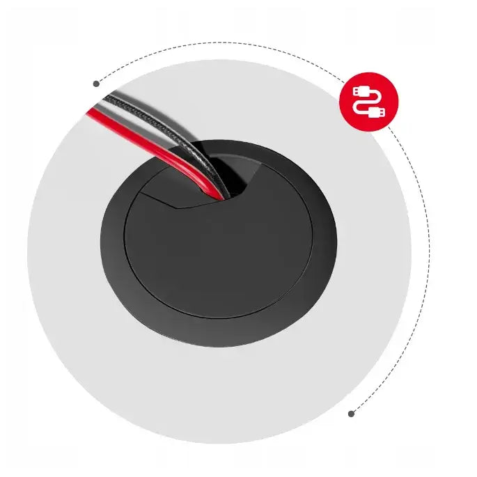 Svart kabeldeksel til Huzaro Hero 1.6 skrivebord, sett ovenfra med synlige røde og svarte kabler.