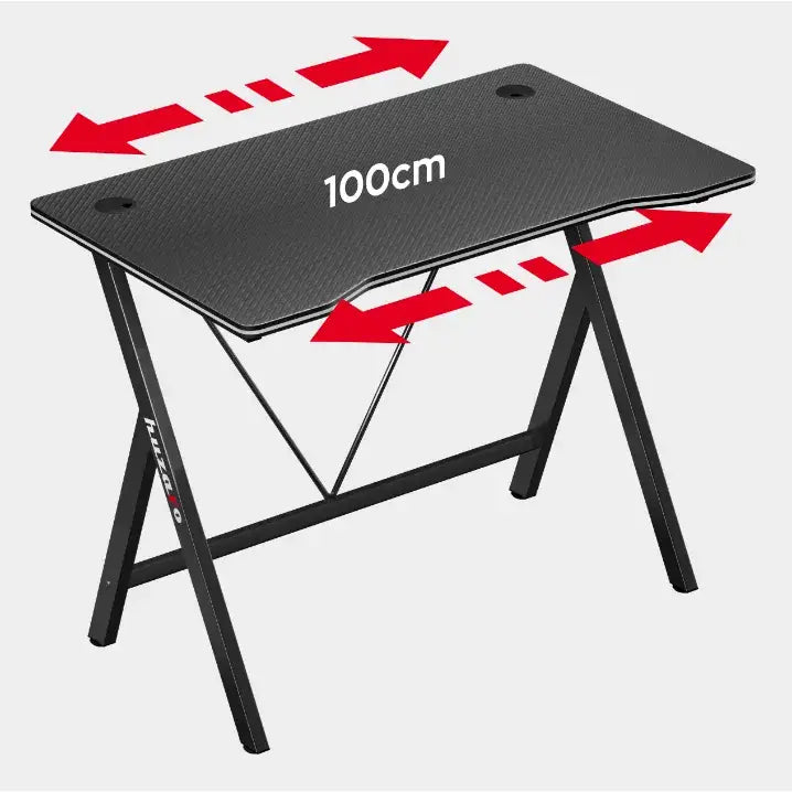 Gamingbord Huzaro Hero 1.4 i svart, skrå oversikt som viser kabelhull, røde breddepiler og teksturert overflate.