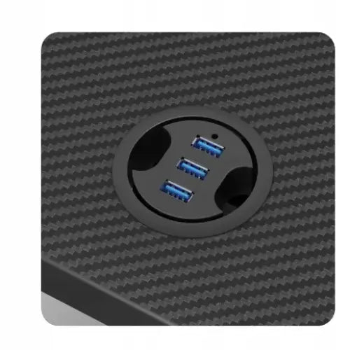 Gamingbord Huzaro Hero 2.5 RGB, nærbilde av tre blå USB-porter på svart karbonfibertekstur, sett ovenfra.