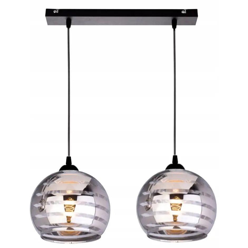 Glass taklampe med to runde, røkfargede glasskupler og synlige LED-pærer, hengende fra sort takfeste.