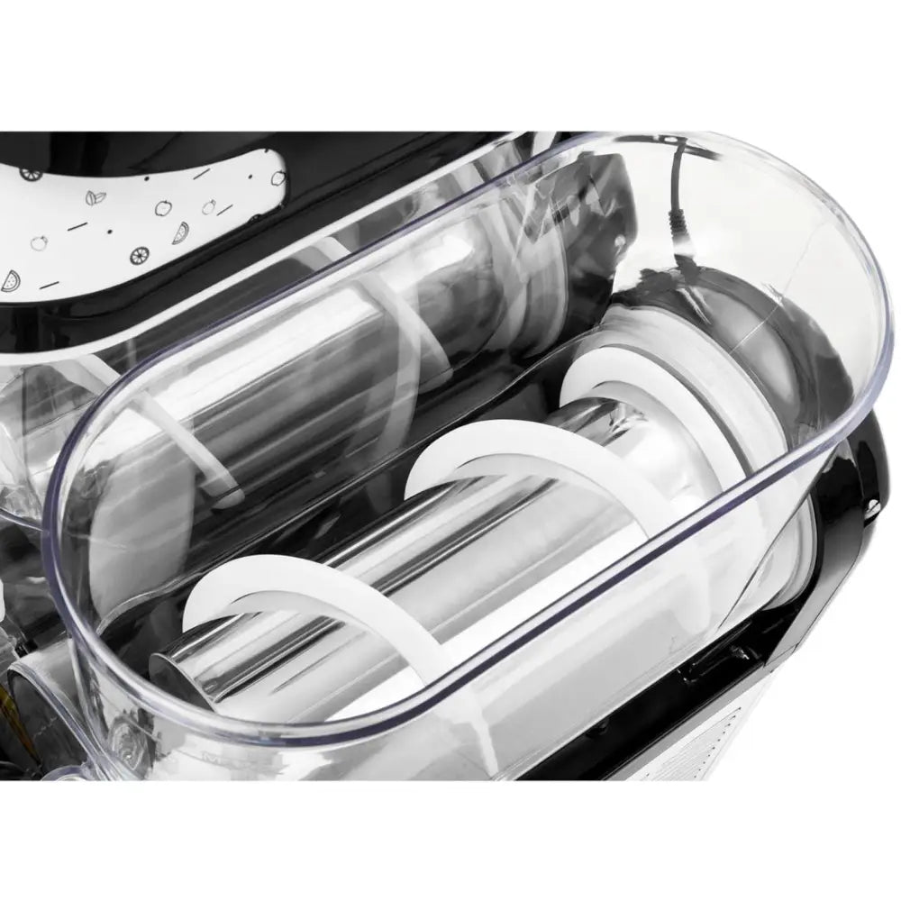 Granitor dobbelt slushmaskin, nærbilde ovenfra som viser to metallvalser og innvendige detaljer i beholderen.