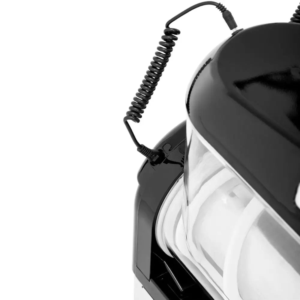 Granitor dobbelt slushmaskin, nærbilde av spiralformet kabel koblet til port på avrundet plastside.