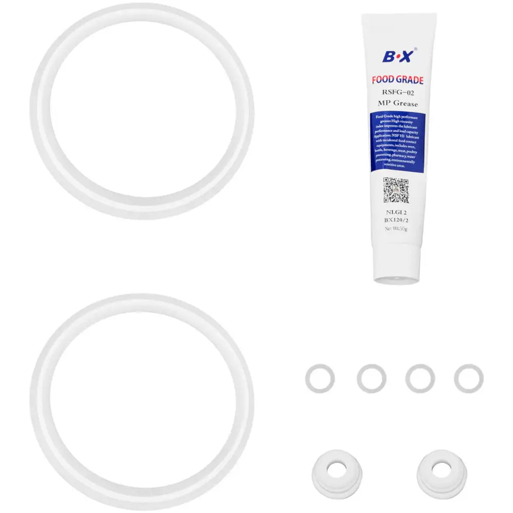 Granitor dobbelt 600 W, oversiktsbilde av gummipakninger og smørefett for vedlikehold, sett ovenfra.