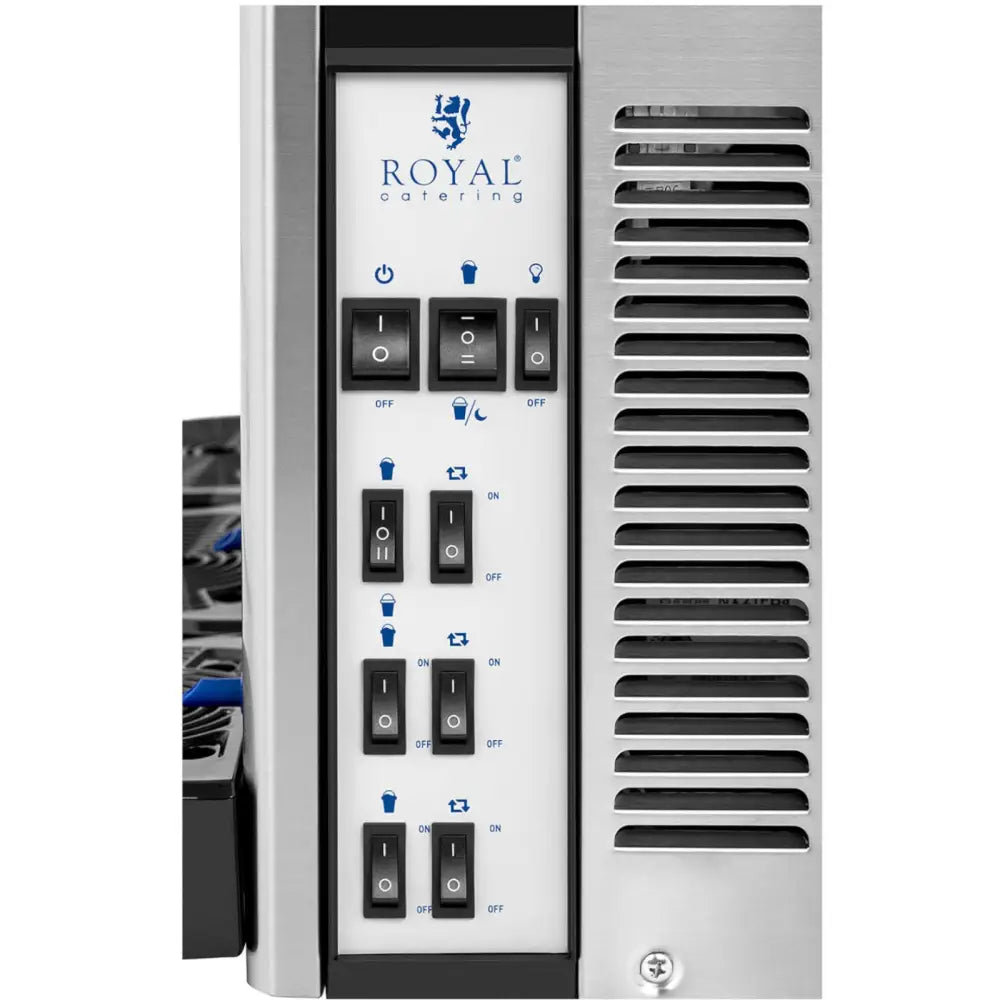 Granitor tre-slusjemaskin, nærbilde av frontens kontrollpanel med svarte vippebrytere og Royal Catering-logo.