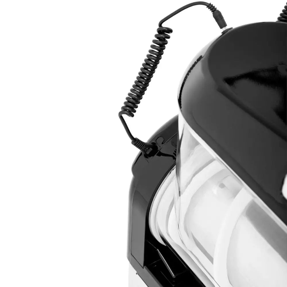 Granitor tre-slusjemaskin, nærbilde av spiralformet ledning koblet til sort og gjennomsiktig maskinhus.