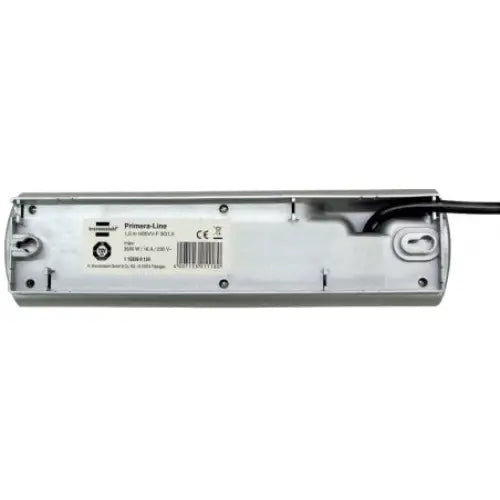 Grenuttak Primera-Line 8-veis, undersiden med synlig etikett og fastmontert strømkabel til høyre.