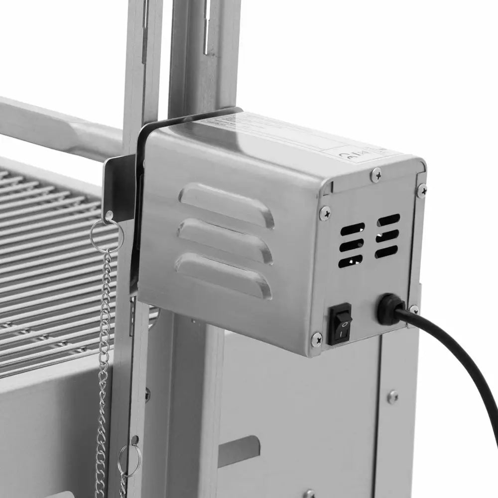 Elektrisk motorenhet i børstet stål montert på grill, nærbilde av bryter og strømkabel på siden.