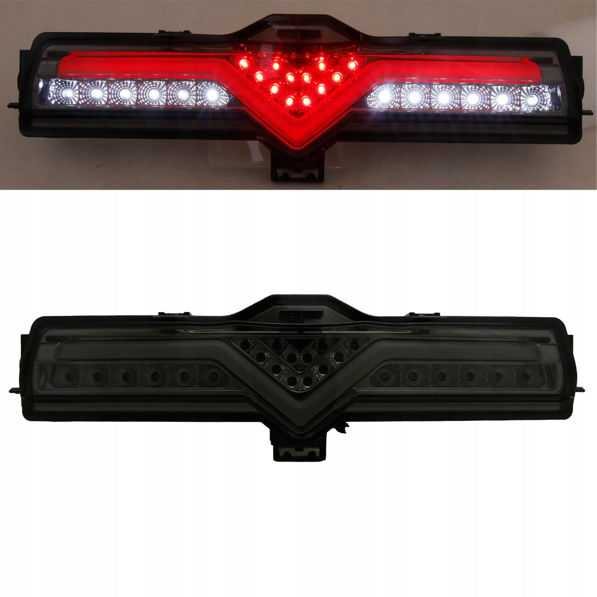 Tent hvit LED-rekke og rød V på smoke chrome-lampen.