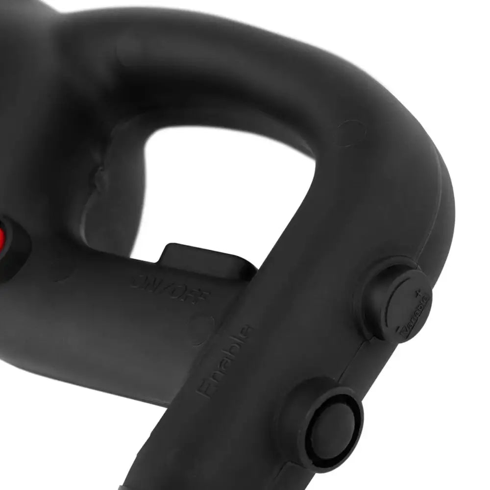 Håndholdt mikserblender, nærbilde av sort plasthåndtak med synlige knapper merket "ON/OFF" og "Enable".