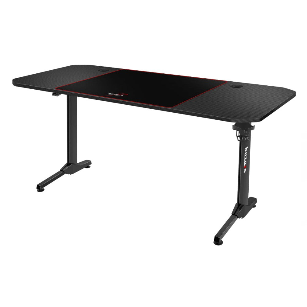Huzaro Hero 4.7 sort gamingbord – nærbilde av carbonbelegg på bordplaten
