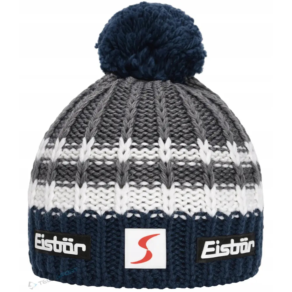 Herre vinterlue fra Eisbar i grått, hvitt og blått, dusk på toppen og synlige logoer foran.