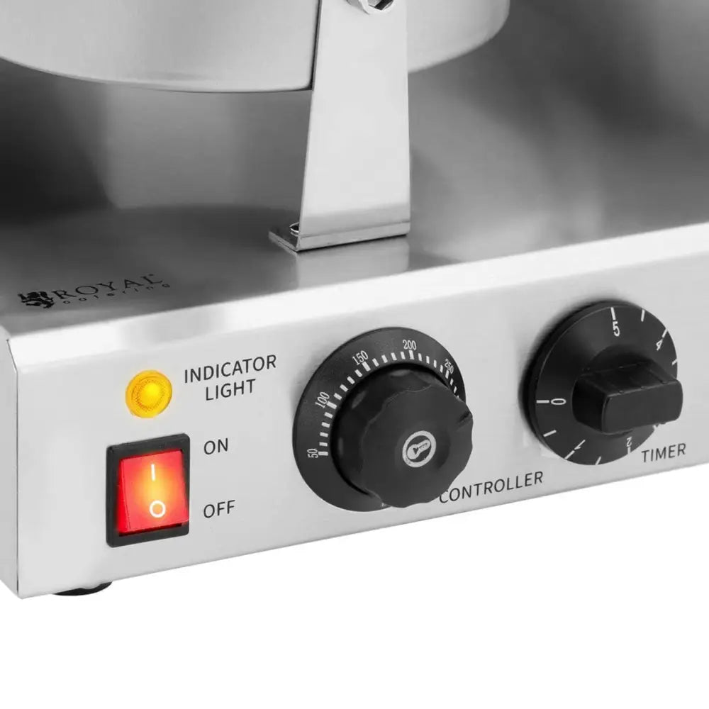 Hjerteformet dobbelt vaffeljern i rustfritt stål, nærbilde av kontrollpanel med bryter, lys og tidsur.