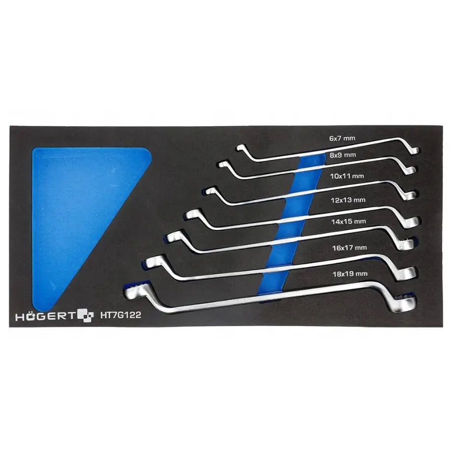 Syv kromfargede vinkelnøkler sortert etter størrelse i sort og blått skuminnlegg, sett ovenfra.