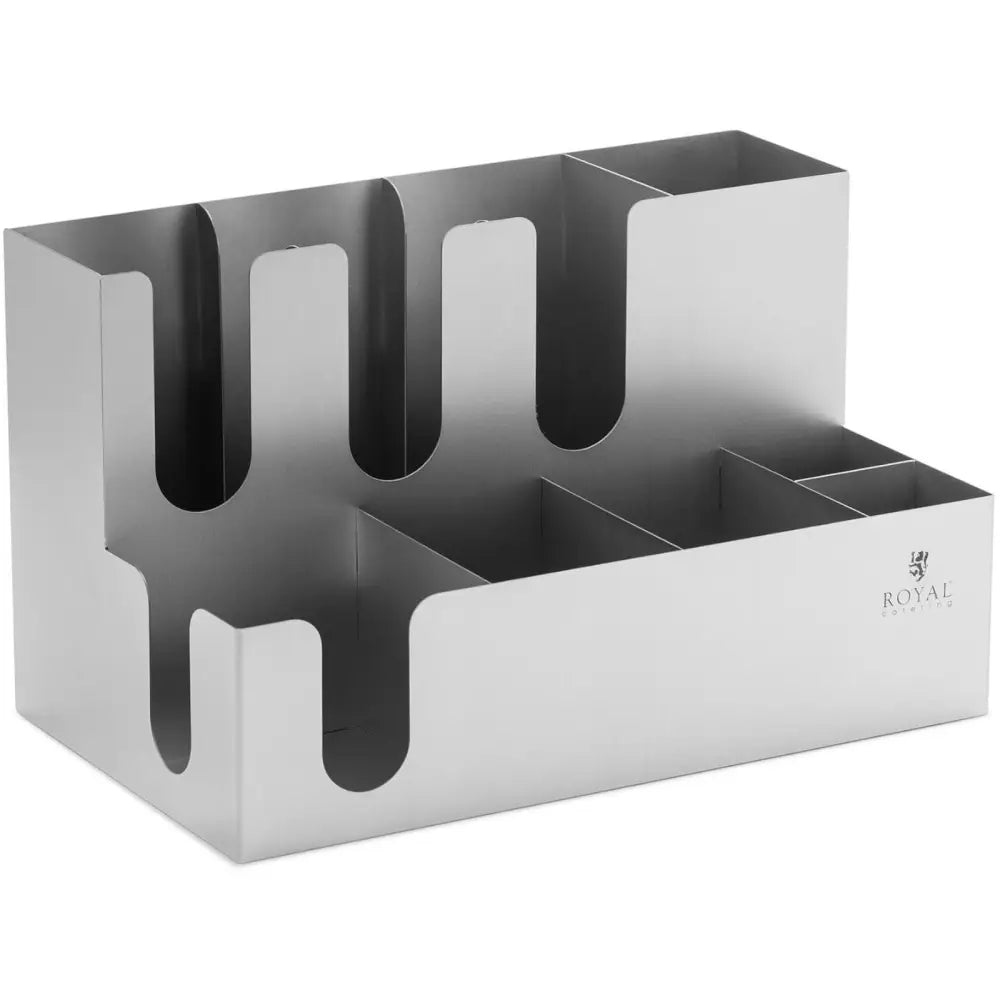 Bestikkholder i børstet stål med åpne rom for kopper, lokk og rørepinner, sett fra skrå front.