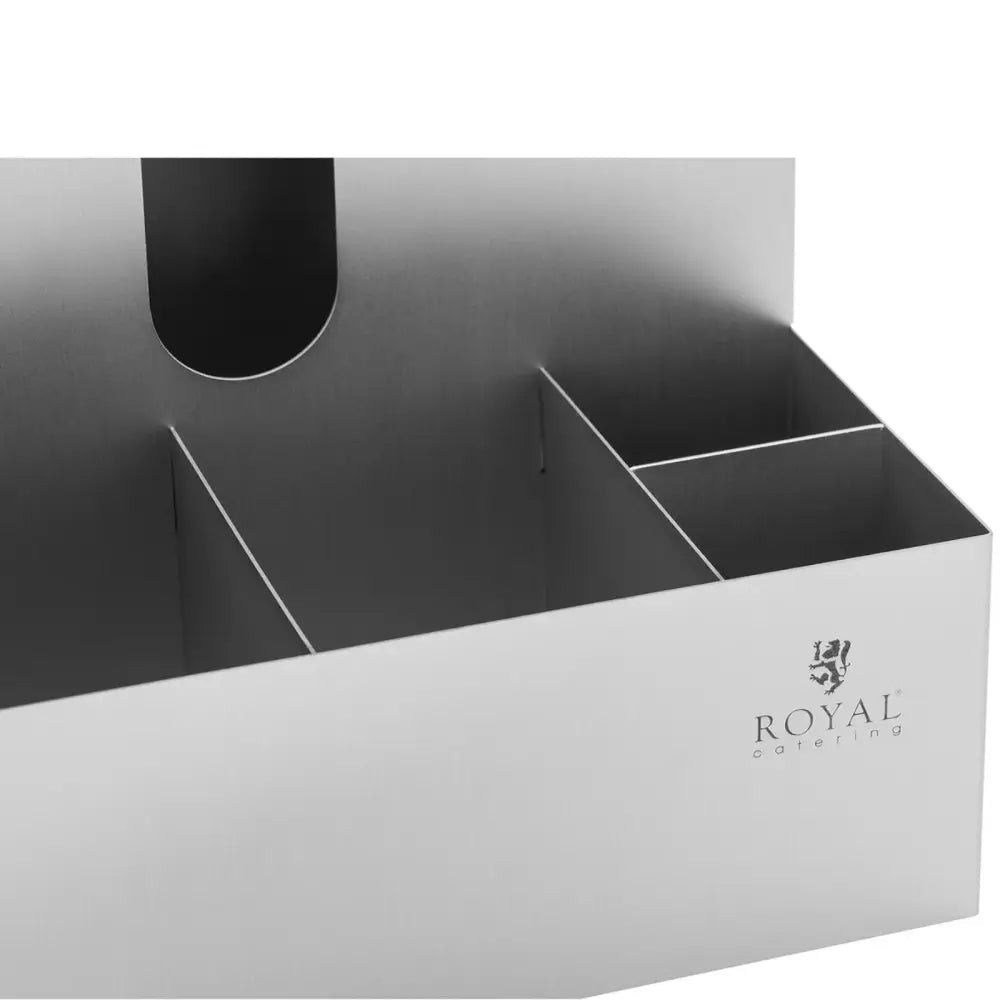 Holder for kopper og tilbehør i børstet stål, nærbilde av inndelte rom og synlig Royal Catering-logo.