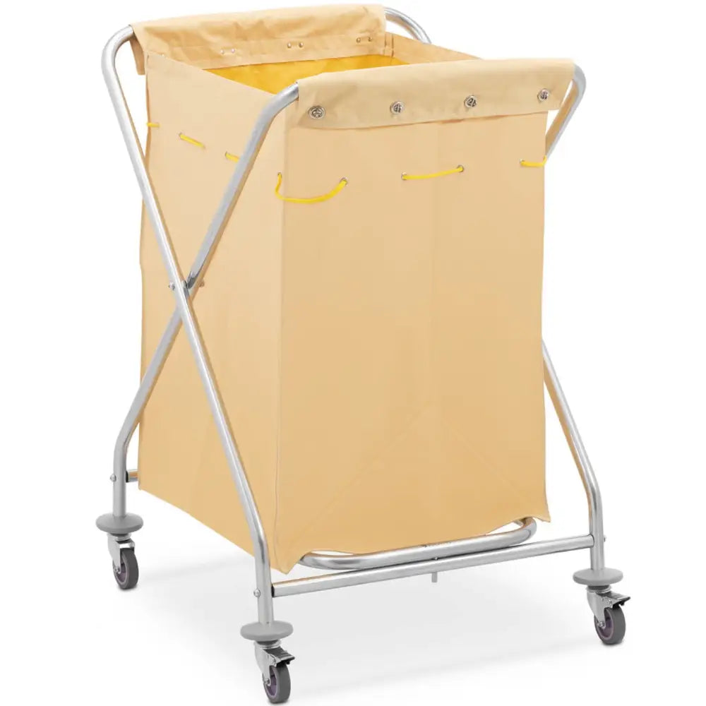 Hotellvogn for sengetøyvask, beige tekstilpose på sølvramme, skrå forfra med hjul og gule snorer synlige.