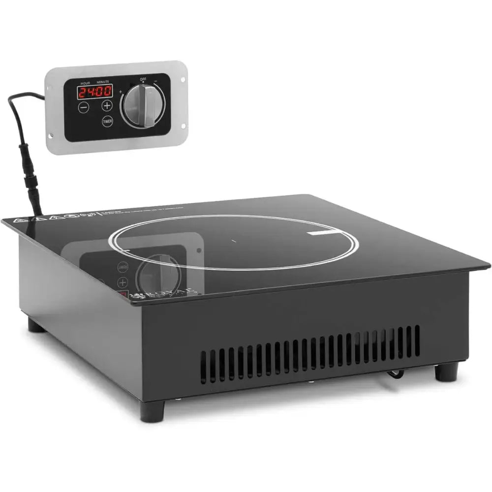 Induksjonskokeplate med én varmesone, skråvisning av glassoverflate og separat digitalt kontrollpanel.